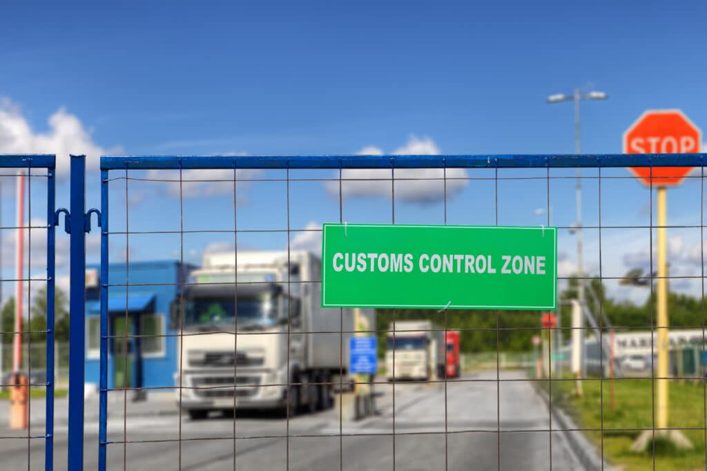 Trucks,Pass,Through,The,Checkpoint,Of,The,Customs,Logistics,Terminal.